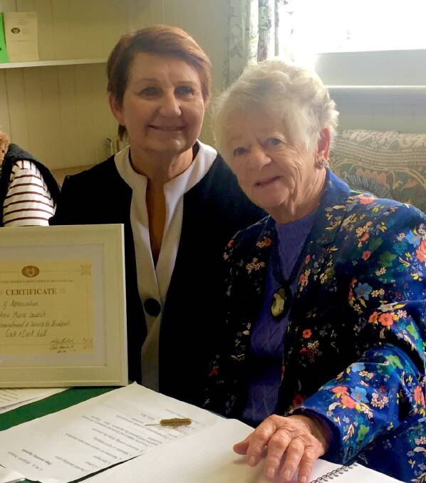 SERVICE: Bridport's Anne-Marie Laubsch received her medal of service from CWA Tasmania president Lindy Cleeland. Picture: supplied