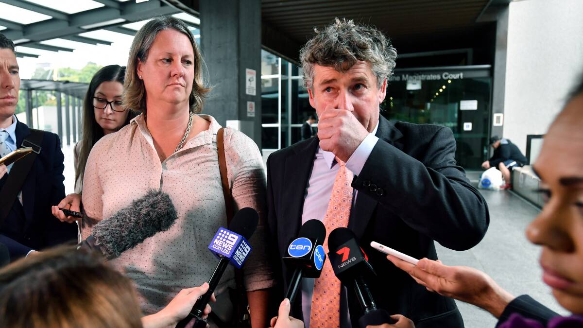 Former Tasmanian farmers Dimity and Michael Hirst talk to the media outside the Brisbane Magistrate Court. Picture: AAP