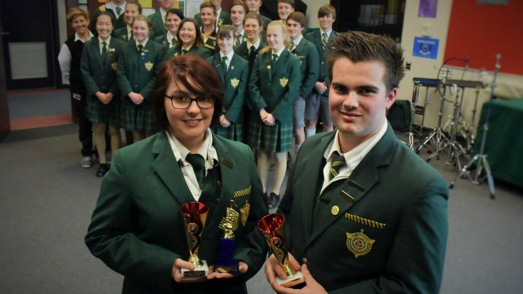 Music captains Paige Luttrell and Ethan Parker in front of the St Patrick's College Concert Band that excelled in a national band competition. Picture: Piia Wirsu