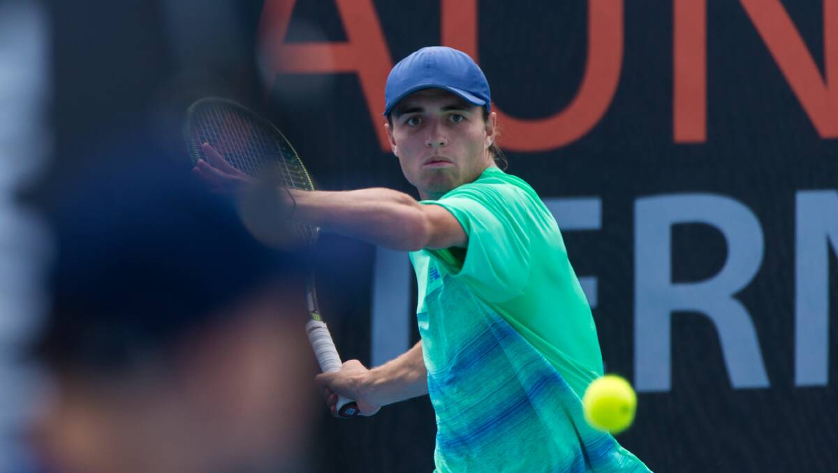 Chris O'Connell takes a swing in his match against Dayne Kelly in the Launceston Tennis International. Picture: Phillip Biggs. Click through to see more photos.