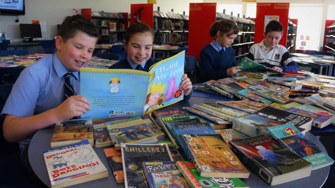 Grade 4 students Jack Reader, Ava Schiliro, Yasmin Wyly and grade 5 student Lachie Snell taking part in the Great Book Swap to raise money for the Indigenous Literacy Foundation. Picture: Piia Wirsu