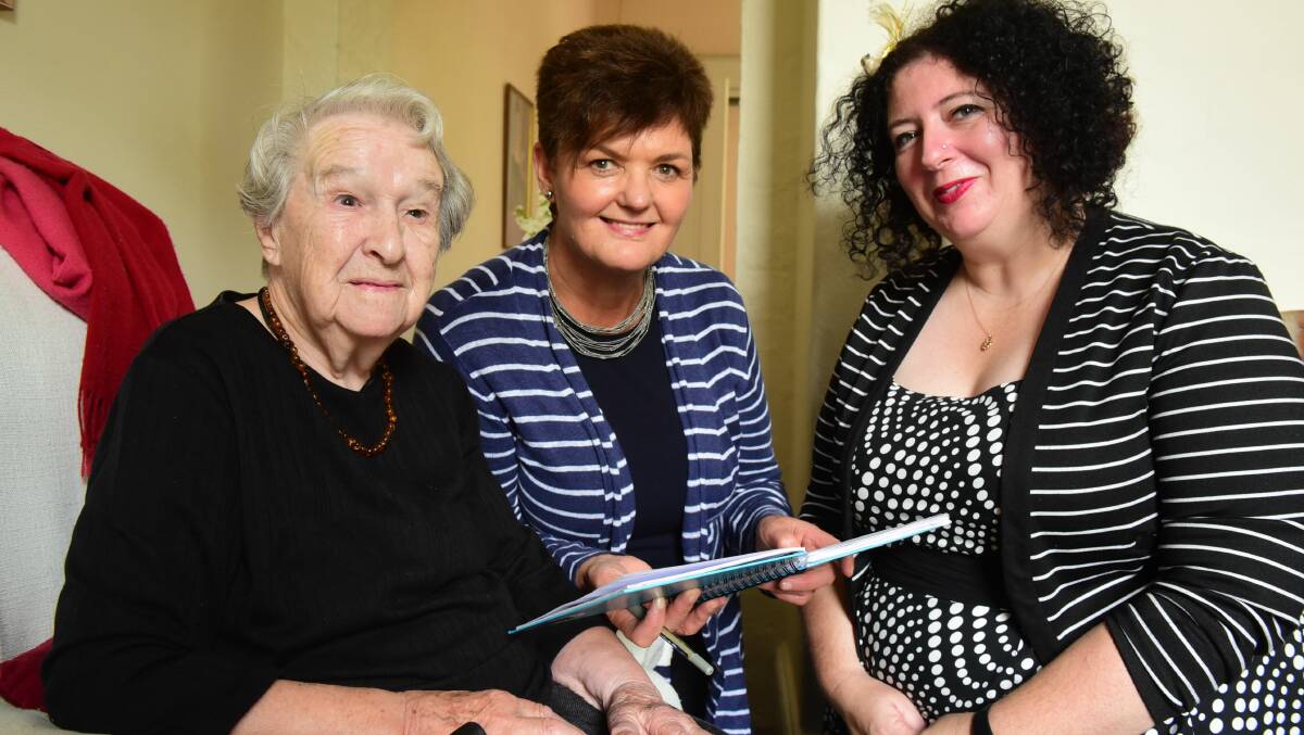 Jean Hearn in her Balfour Street home with Peace Trust innugural chairwoman Jo Archer and festival coordinator Sonja Hindrum.