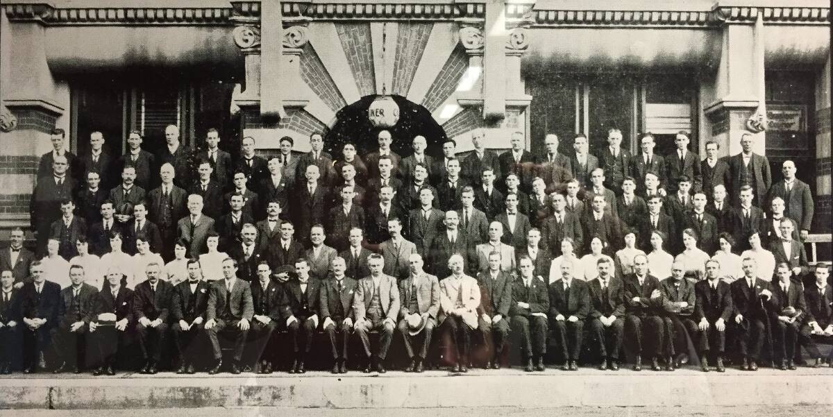 Ties that bind: A staff photograph of the workforce in 1917 shows the formal dress code of the times.