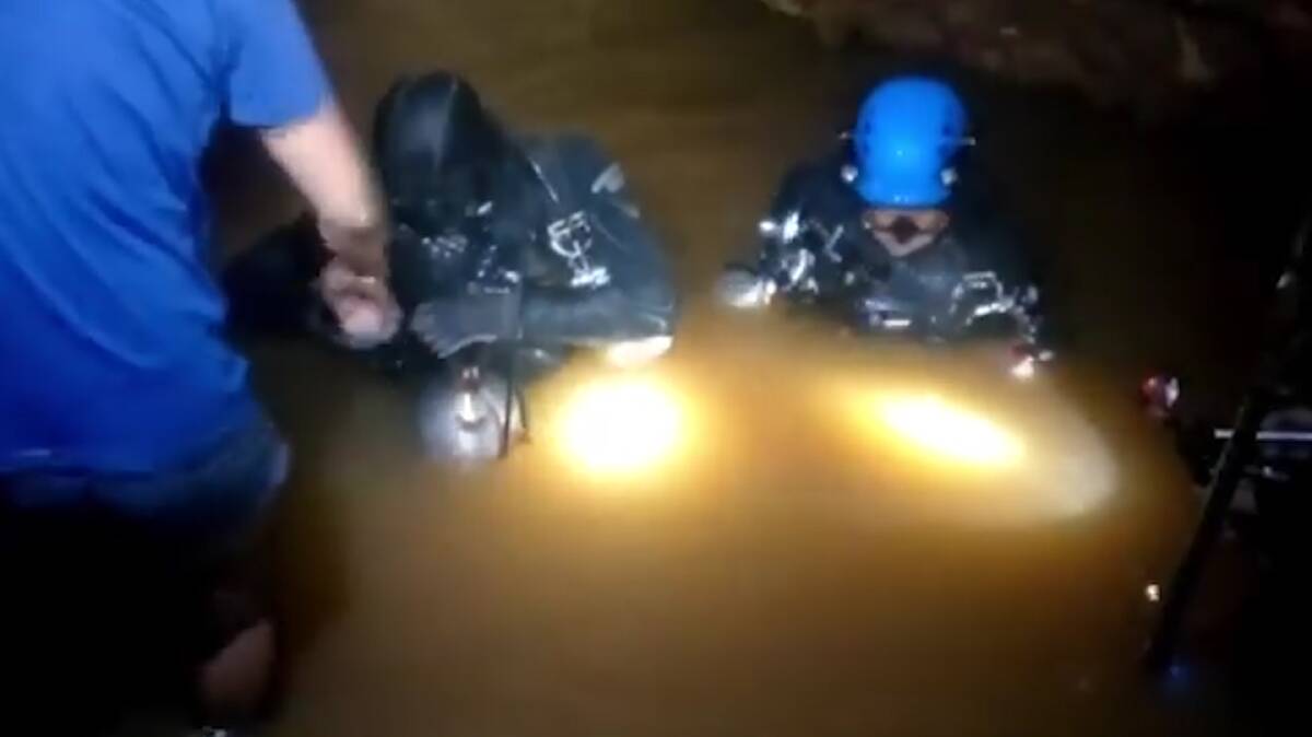 Heroes: Thai Navy Seals conduct diving operations in the flood cave.