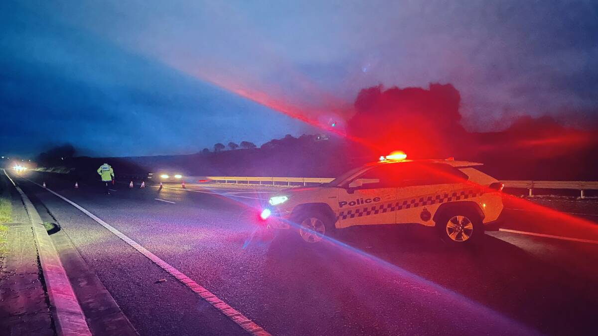 Police blocked the Bass Highway between the Port Sorell turnoff and the Mersey Community Hospital on Tuesday night. Picture: Sandy Powell 