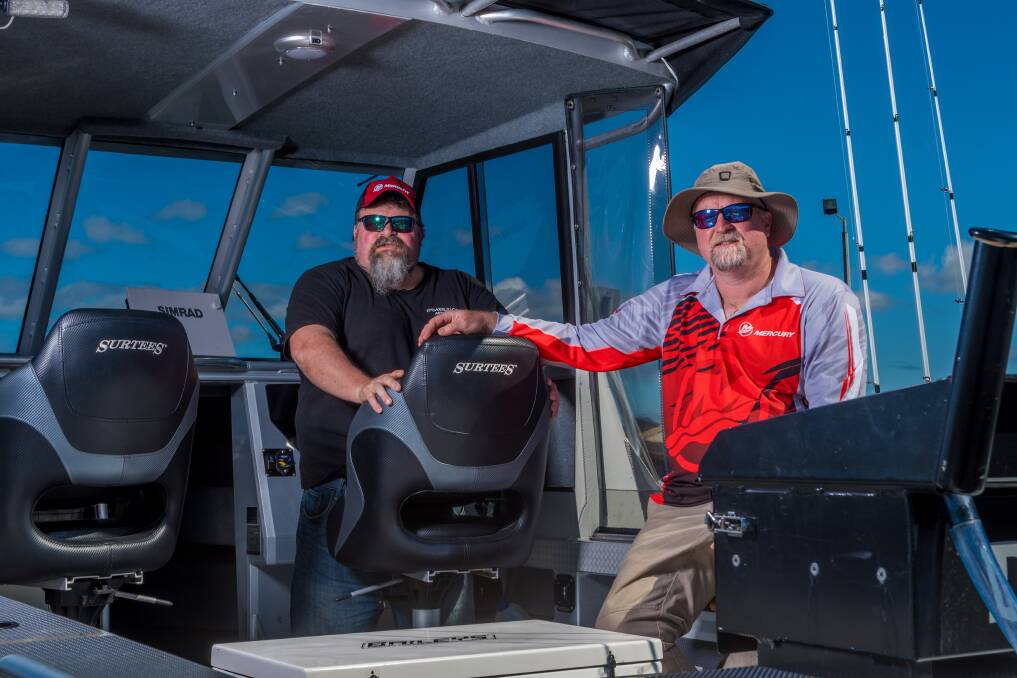 FISHIN': Kelly ''Hooch'' Hunt and Clinton Howe gear up for a beautiful day on the water, fishing and exercising their right to democratic involvement in the Tasmanian government's 10-year seafishing strategy. Picture: Phillip Biggs 