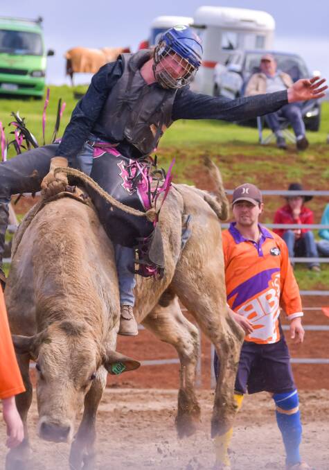 Adam Clark during the bull riding competition at the 2019 Burnie Show. Picture: Simon Sturzaker 