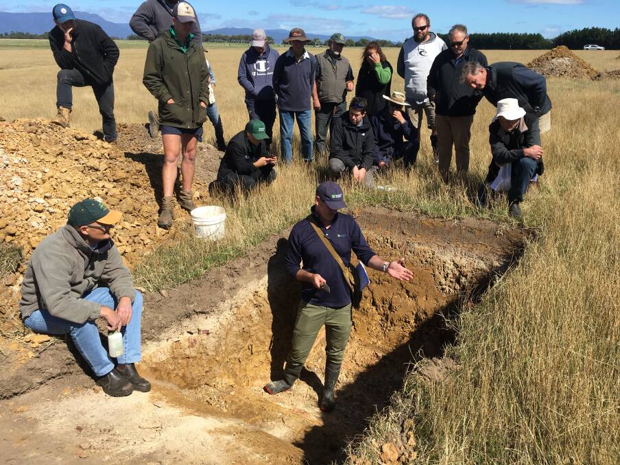 SOIL SCRUTINY: Participants examine the pasture management pit that is part of the NRM North Pasture Management trial. Picture: Supplied