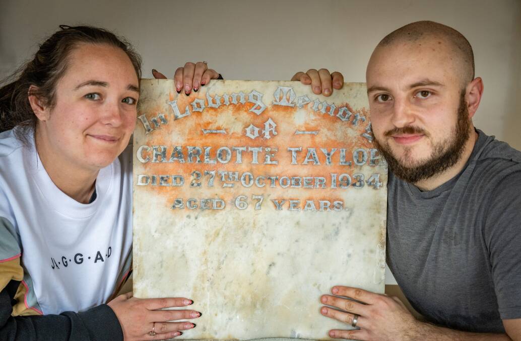 Tasmanian home renovators Gemma and Jamie Free discovered a gravestone secretly embedded into their kitchen bench. Photos:: Paul Scambler