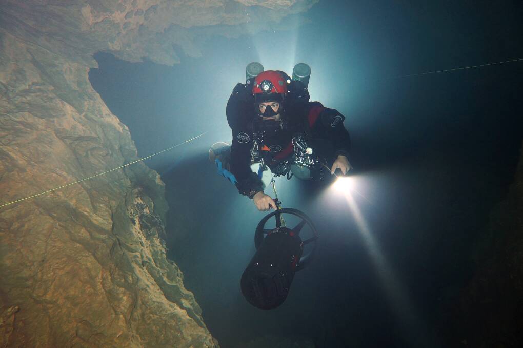 RISK: Andreas Klocker in a Mexican sump. Mr Klocker cave dives in Tasmania, but also travels to Mexico for the Huautla Resurgence Project, which involves cave diving through several sumps. Picture: Supplied 