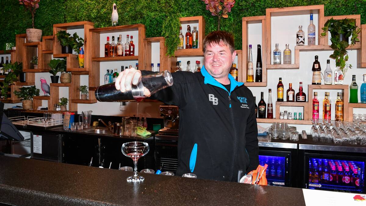 Back pouring drinks: Front Bar manager Stephen Higby. Picture: Neil Richardson