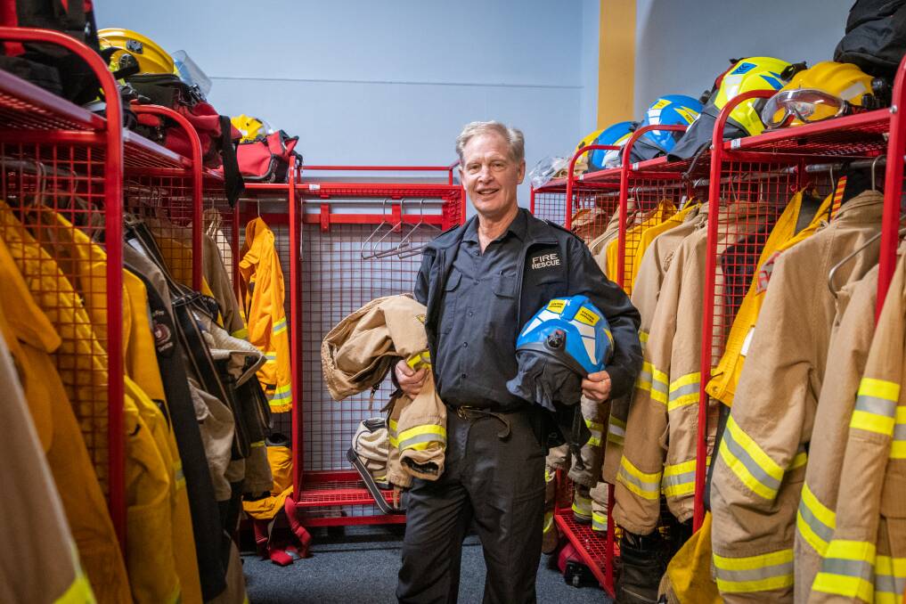 FOND FAREWELL: Launceston Fire Brigade Station Officer Roger Whittle has hung his uniform for the very last time, entering retirement. Picture: Paul Scambler