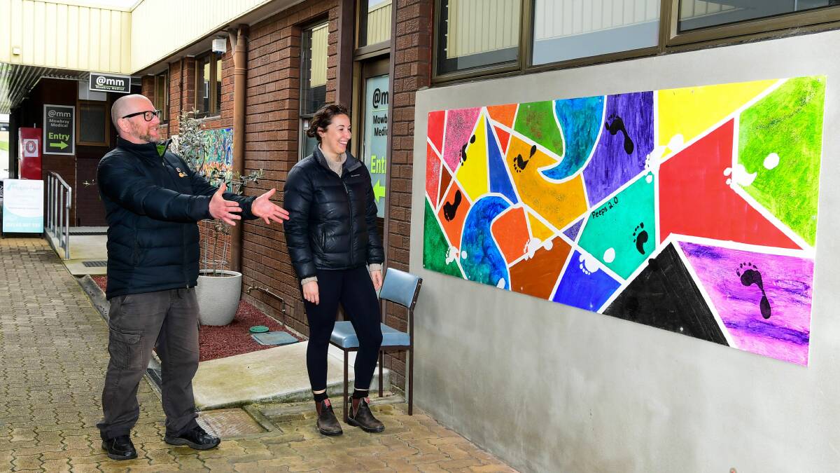 Colourful creation: Fakington Wilde and Georgia Axton with one of the new pieces of art. Photo: Neil Richardson.