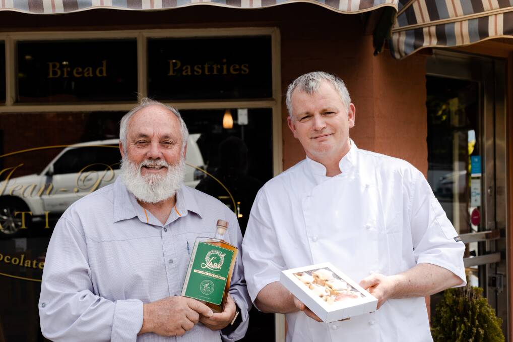 Festive spirit: Bill Lark and Jean-Pascal Lepretre with their wares. Picture: Supplied