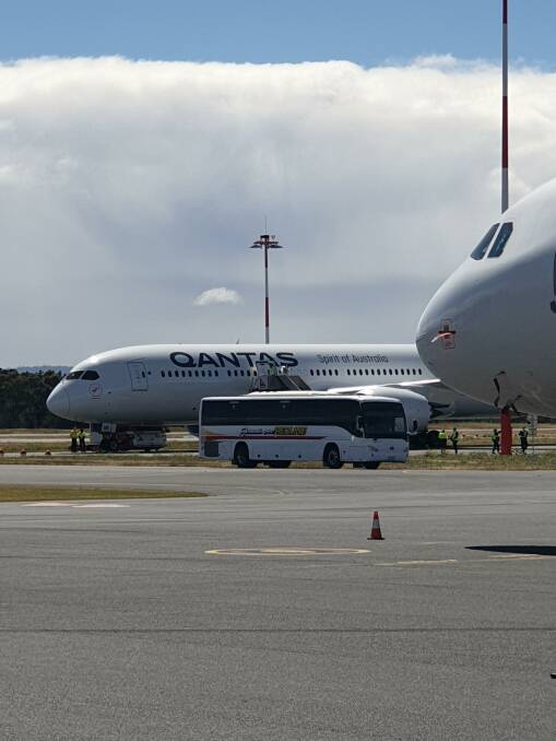Landed: The first repatriation flight touched down in Hobart on Sunday. Picture: Supplied