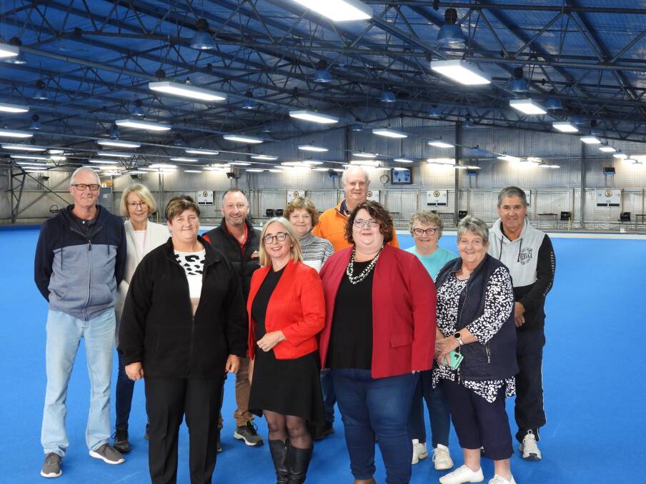 BOWLS CLUB: Kings Meadows Bowls Club president Maxine Viney, Bass Labor MHA's Michelle O'Byrne and Jennifer Houston, with Labor Bass candidate Adrian Hinds and members of the bowls club. Picture: Supplied
