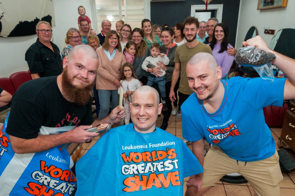 CLEAN LOOK: Tom Jackson, Daniel Hartley and Josh Martin after the shave. Picture: Phillip Biggs