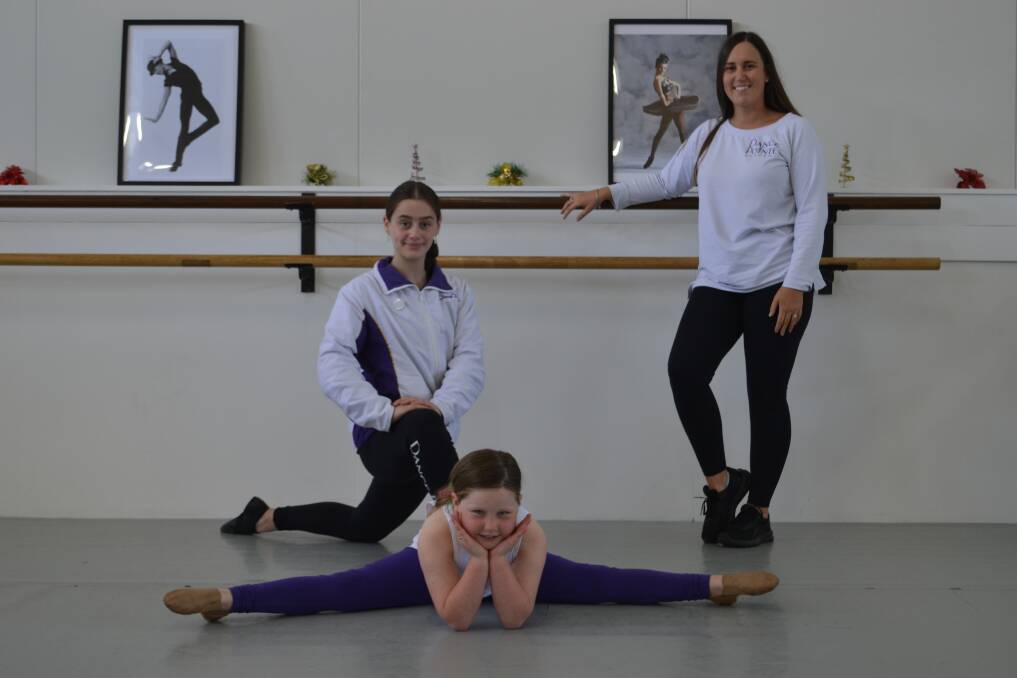 Competition ready: Dance Pointe students Lyla Stingle (centre) and Abigail Van Niekerk with teacher Tayla Broomby. Picture: Ebony Abblitt