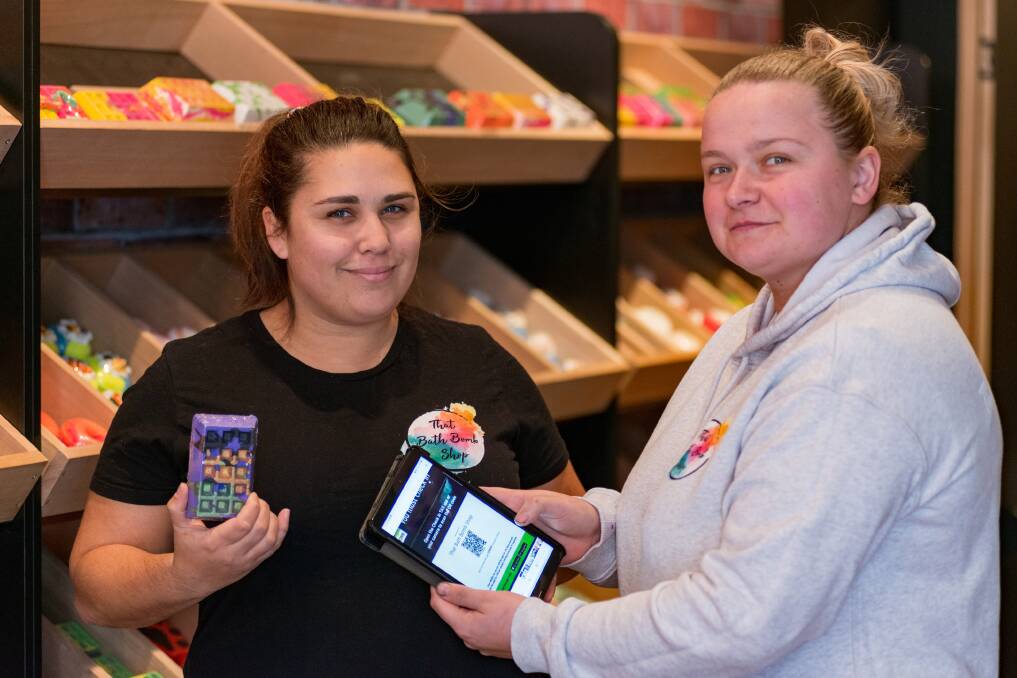 READY TO GO: That Bath Bomb Shop owners Ashlee and Lisa Morgan have had their QR code for weeks. Pictures: Phillip Biggs