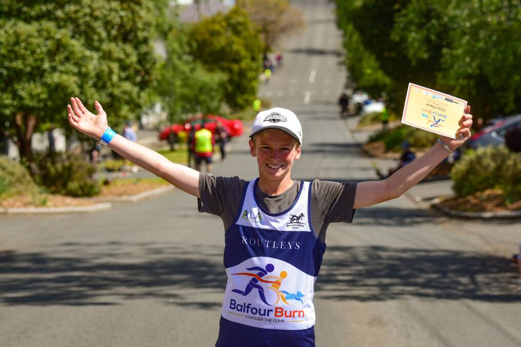 Grinning winner: 12-year-old Griffin Poke after winning his category. Picture: Paul Scambler
