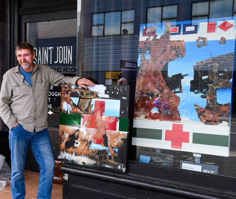 On display: Fred McCullough with his artwork outside Saint John Craft Beer on St John Street. Picture: Neil Richardson