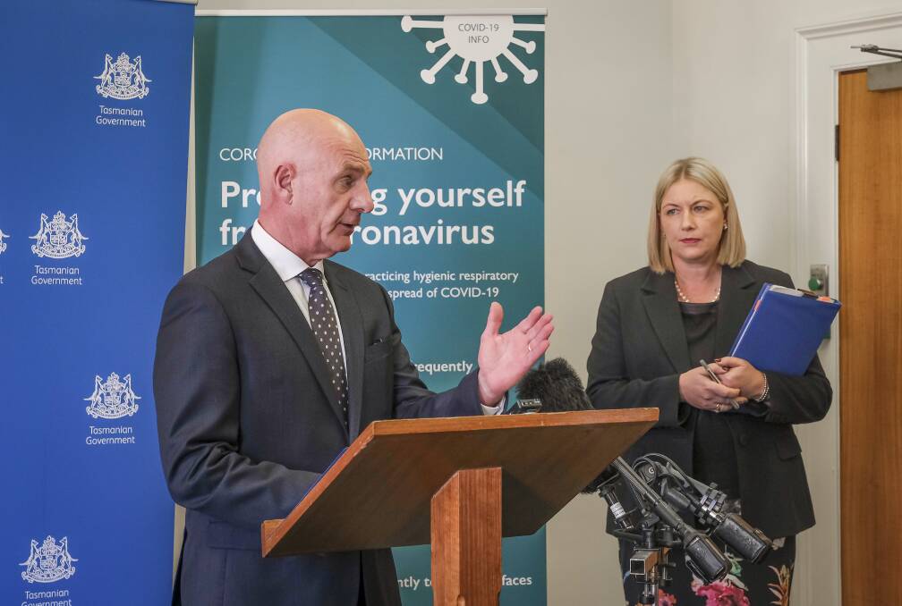 BORDER BAN: Premier Peter Gutwein and State Health Commander Kathrine Morgan-Wicks announcing the designation of Victoria as high-risk. Picture: Craig George