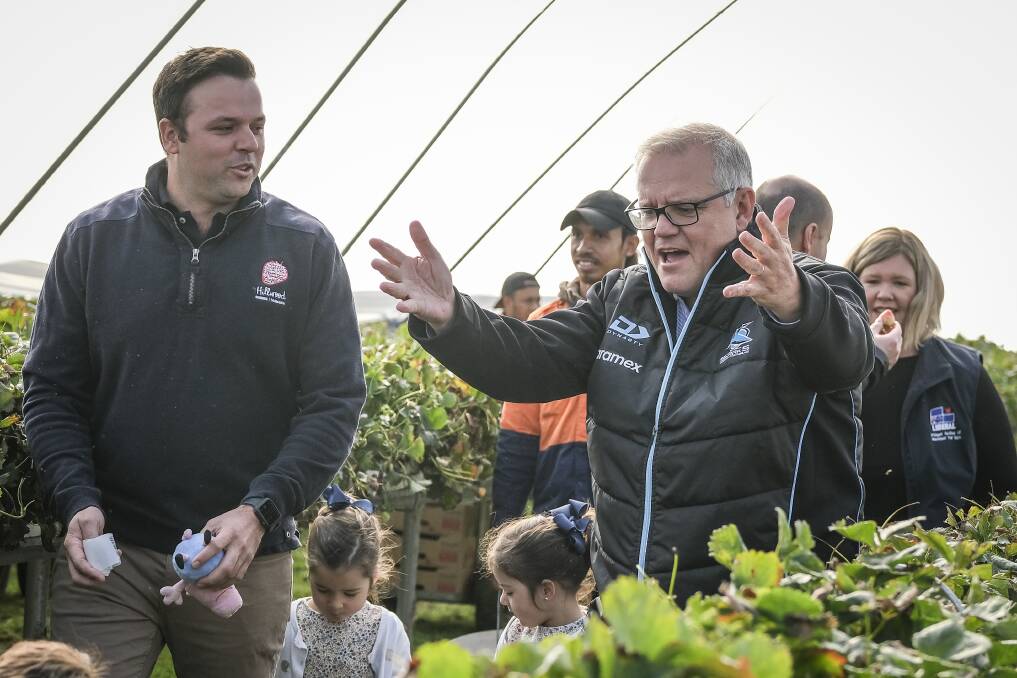 Fruitful visit: Marcus Dornauf of Hillwood Berries with Prime Minister Scott Morrison at the Hillwood farm on Friday. Picture: Craig George