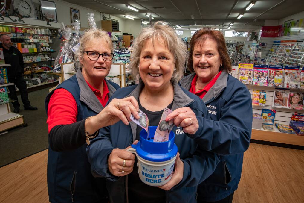 RAISING MONEY: Deloraine Newsagency owner Debbie Willis with staff members Kerri Watson and Gaylene Crawford as part of the Winter Relief Appeal. Picture: Paul Scambler.