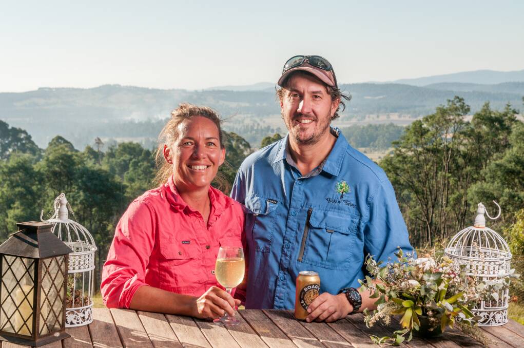AWARD WINNER: Fork n Farm owners Cassie Lobley and Aaron 'Lob' Lobley enjoy a celebratory drink at their Glengarry home. Pictures: Phillip Biggs