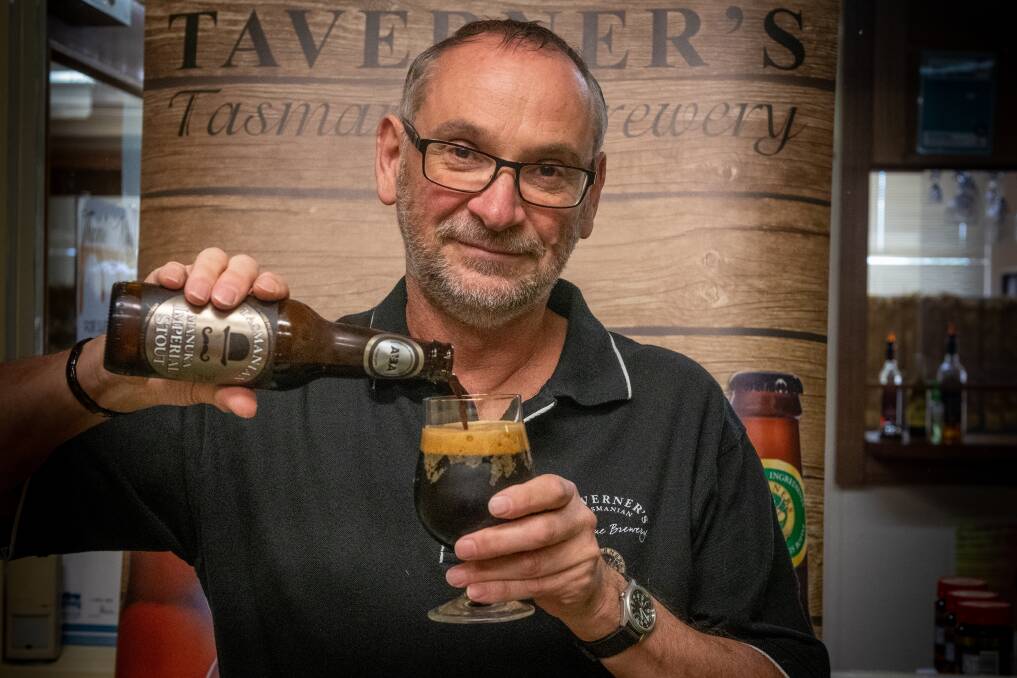 Top drop: Tim Penton from Taverner's Brewery with the award winning Manuka Imperial Stout. Picture: Paul Scambler