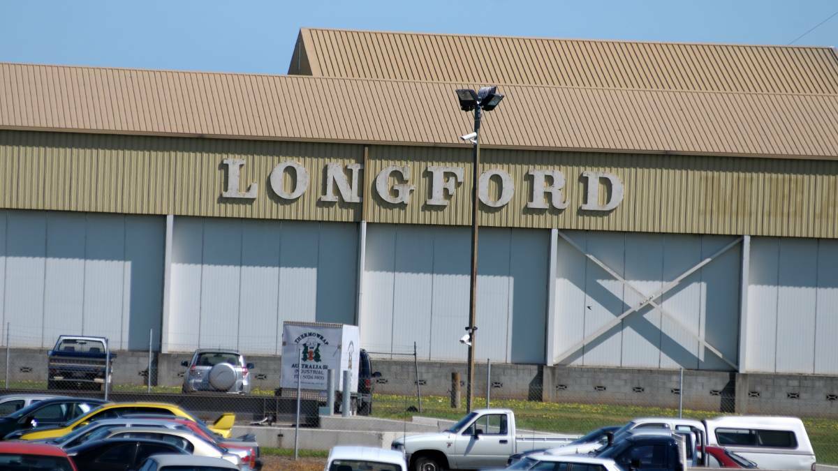 Nearly 300 workers at JBS' Longford abattoir were stood down on Monday, following a cyber attack on the multinational company.