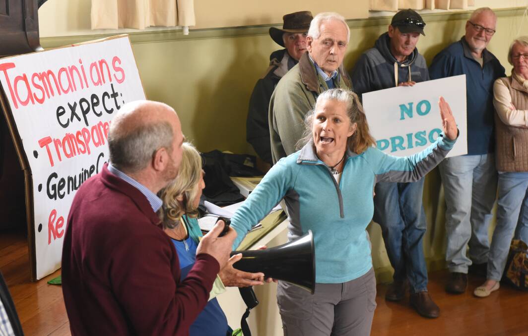 PIECE OF MIND: Westbury resident Liza de Lautour lets Lyons Liberal MHA Mark Shelton know what she thinks of the state government's proposal to build the Northern Regional Prison just outside her town. Picture: Paul Scambler