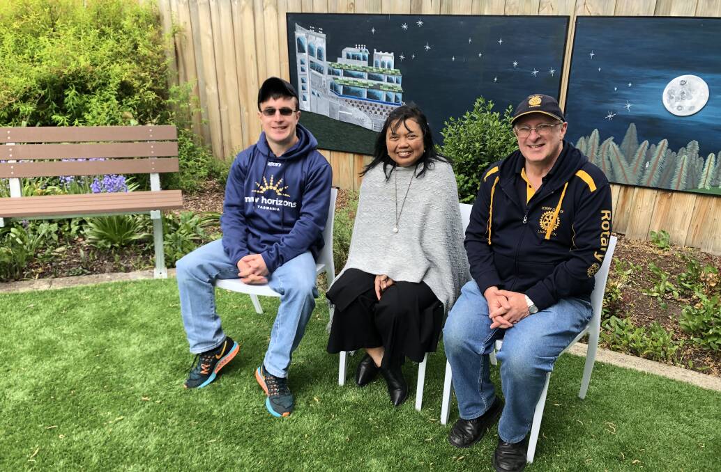 EXCITED: New Horizons client Matt Bowen, Bea Williams and Rotary Club of Launceston member John Dent enjoy the new accessible garden.