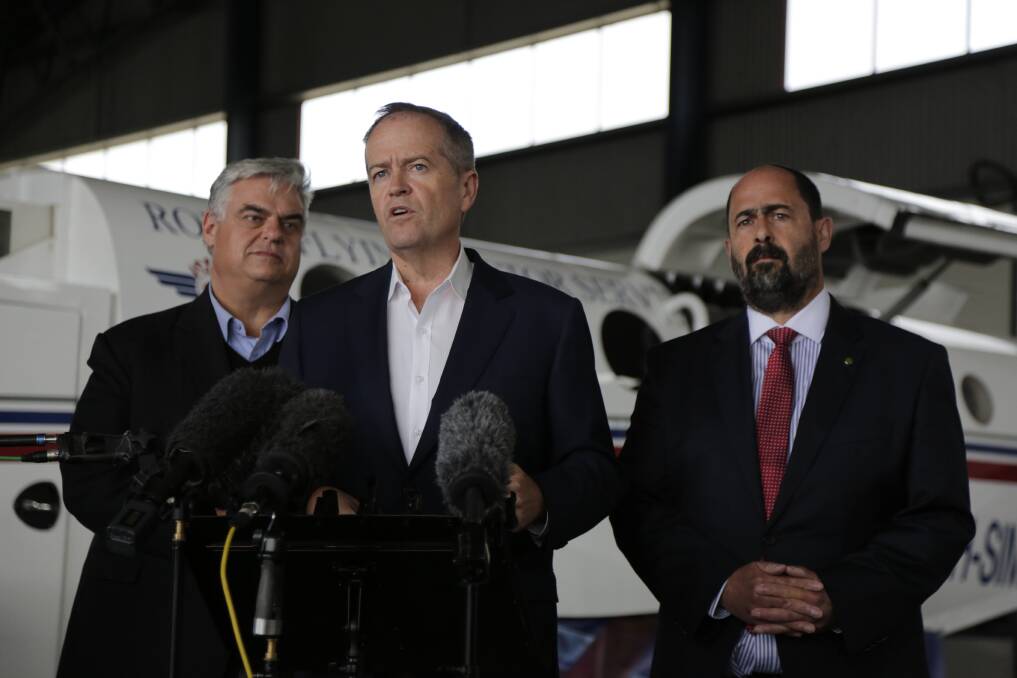 FLYING HIGH: Bill Shorten with Lyons Labor MHR Brian Mitchell and Bass Labor MHR Ross Hart at Western Junction on Saturday afternoon. Picture: Matt Dennien