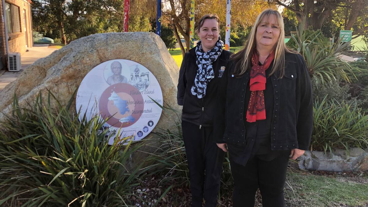 Flinders Island Aboriginal Association chief executive Maxine Roughley (front) and Toni Woods (back) at the FIAA office at Lady Barron. FIAA is the island's biggest employer.