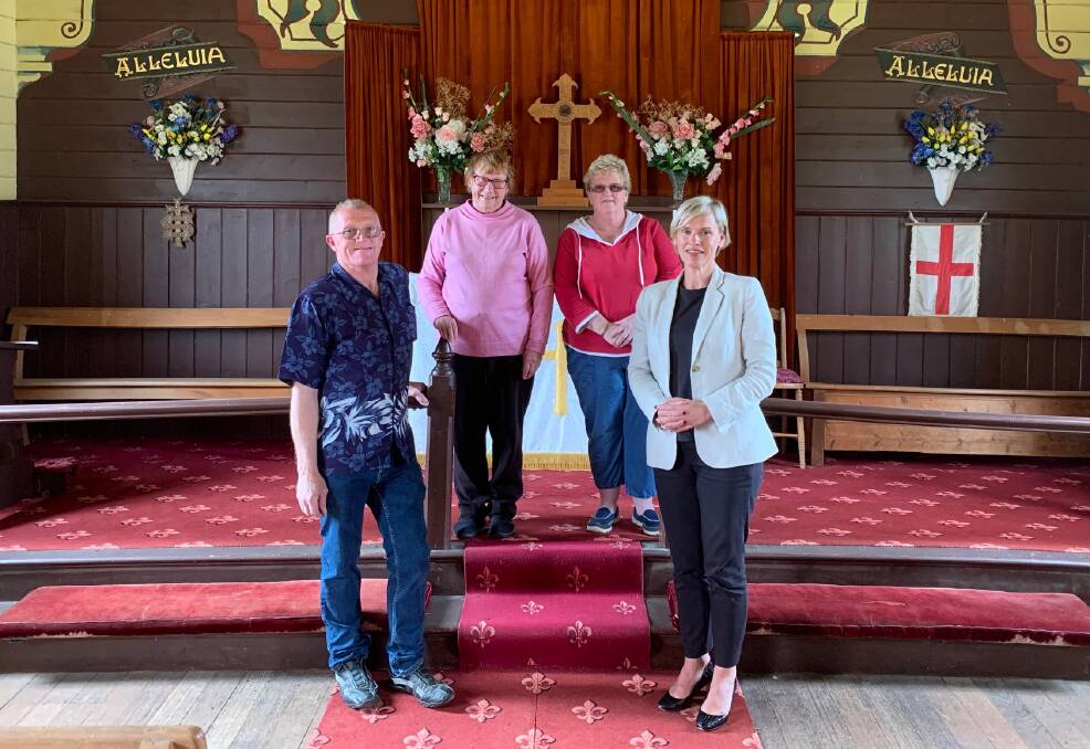 KEEP THE FAITH: Mathinna locals (L-R) Rob Parsons, Cynthia Webb and Christine Scott with Jen Butler MP in St George's Church. A local community group headed up by Mr Parsons wants to buy the property. Picture: Supplied

