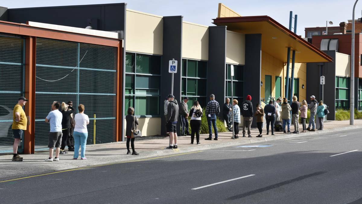 People queue up outside Centrelink in Burnie earlier this year. Picture: Brodie Weeding