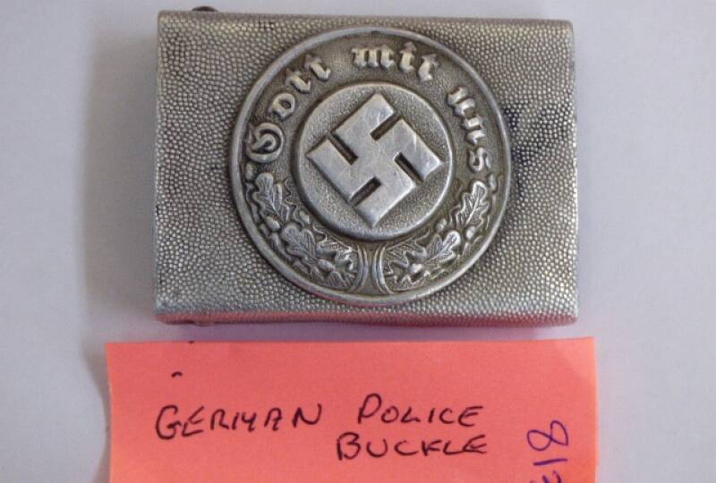 A police buckle from Nazi Germany was one of a number of items of memorabilia sold at Armitage Auctions last Wednesday. Picture: Supplied
