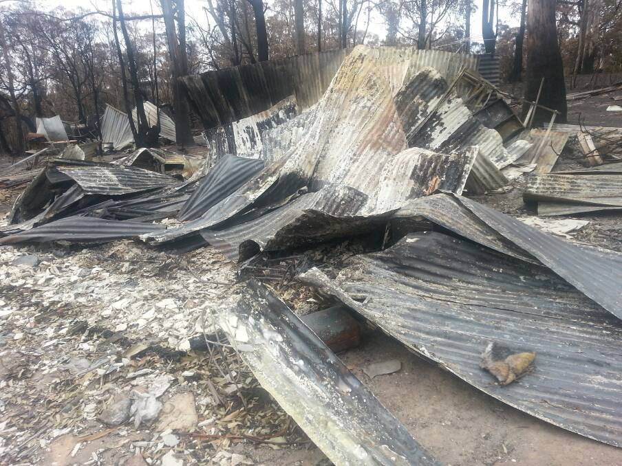 DESTRUCTION: The wreckage of Shane Wessing's Dunalley home, as it appeared after the devastating fires. Picture: Supplied
