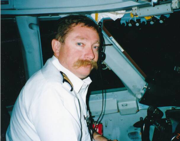 FLYING HIGH: Rowles was a second officer with Qantas, doing long-haul flights in Boeing 747s. Picture: Supplied