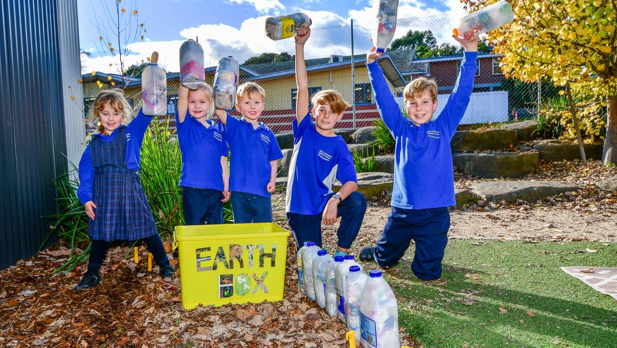 ECO-WARRIORS: West Launceston Primary School kinder students Alice Gordon, Emmerson Cannell and Jonty Turner with Year 6 student Riley Ellery and Year 5 student Oliver Courtney. Picture: Scott Gelston