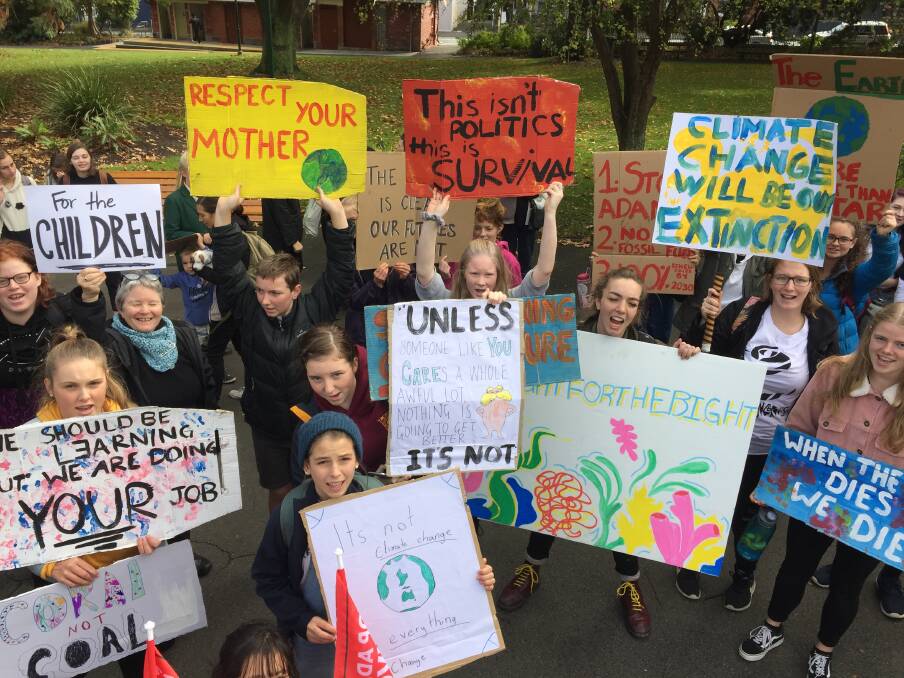 Students taking part in a School Strike for Climate march in Launceston on Friday. Picture: Supplied