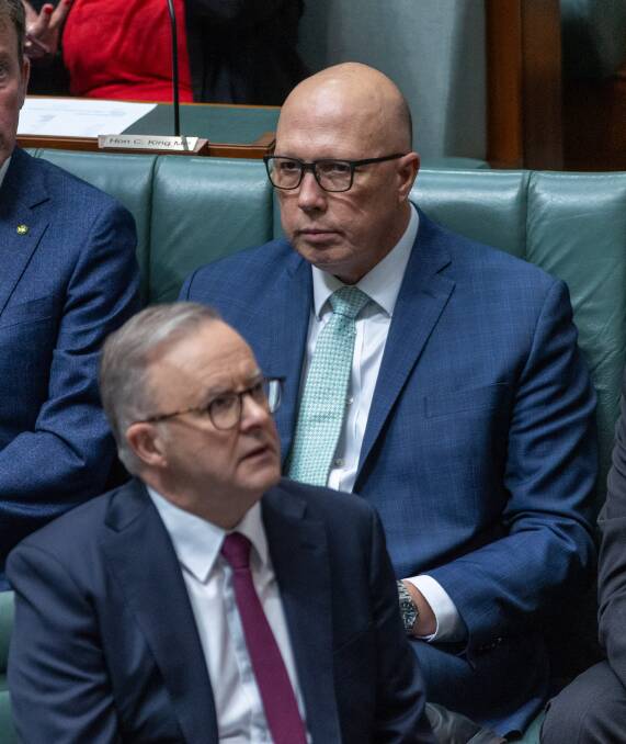 Opposition Peter Dutton with his eye on Prime Minister Anthony Albanese's chair during a division. Picture By Gary Ramage