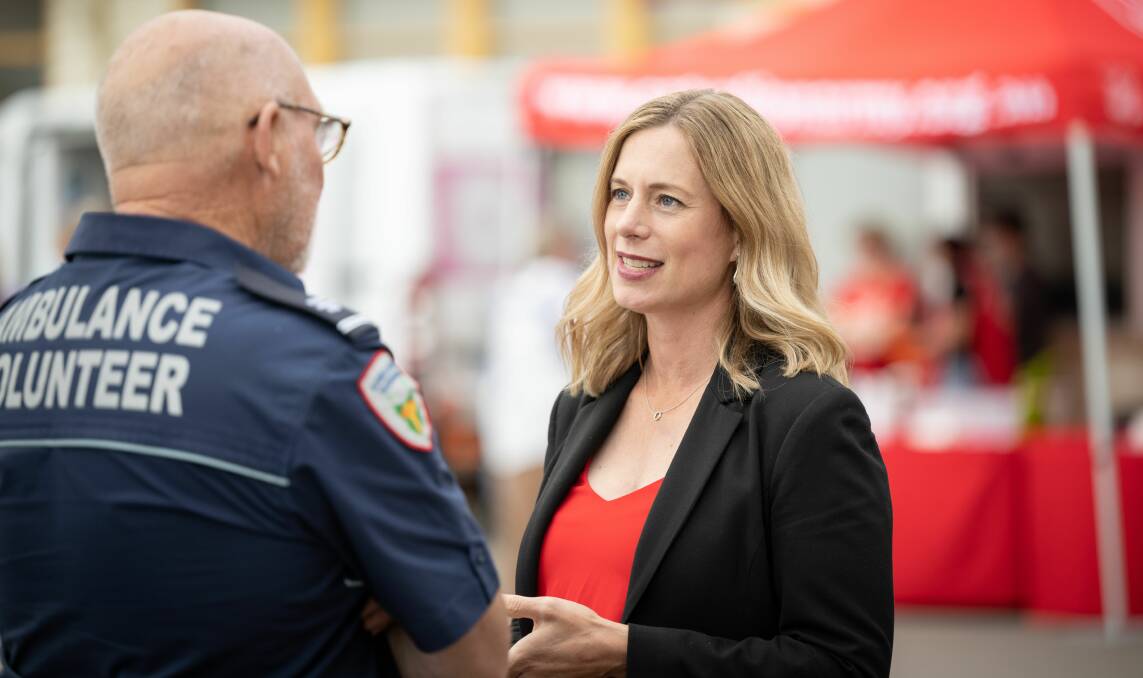Opposition Leader Rebecca White talks with an Ambulance volunteer. Picture supplied.
