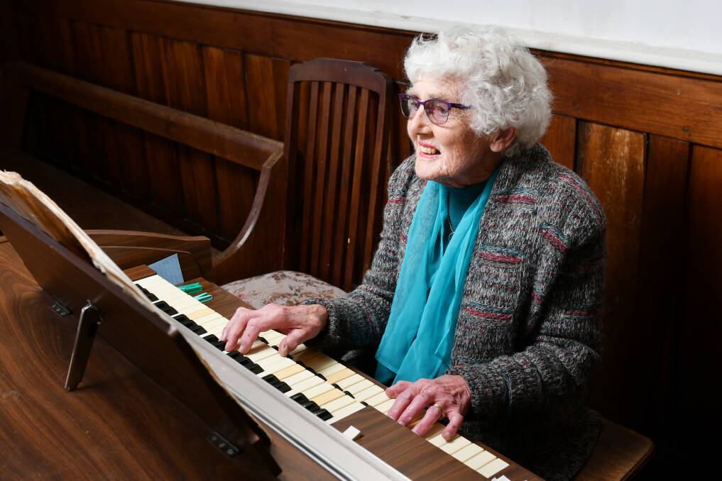 Still Playing: Patricia Stewart has been the organist at her Moriarty church for decades and is devastated to learn it could be sold by the diocese. Picture: Brodie Weeding.