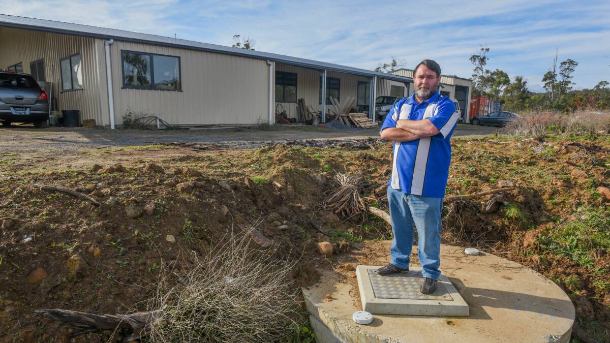 Waiting game: Brett Goss, of Underwood, a VIP Sheds victim now waiting for approvals for certificate of occupancy. Picture: Paul Scambler.