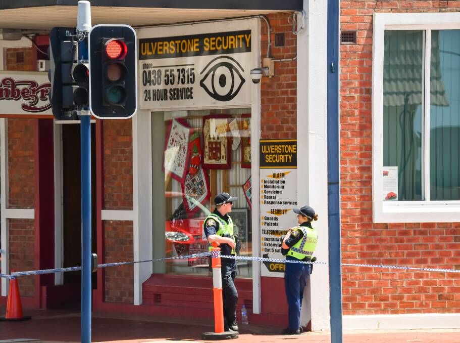 Raid: Police at the scene of Andrew Morrison's Ulverstone business in 2018. Picture: Simon Sturzaker.