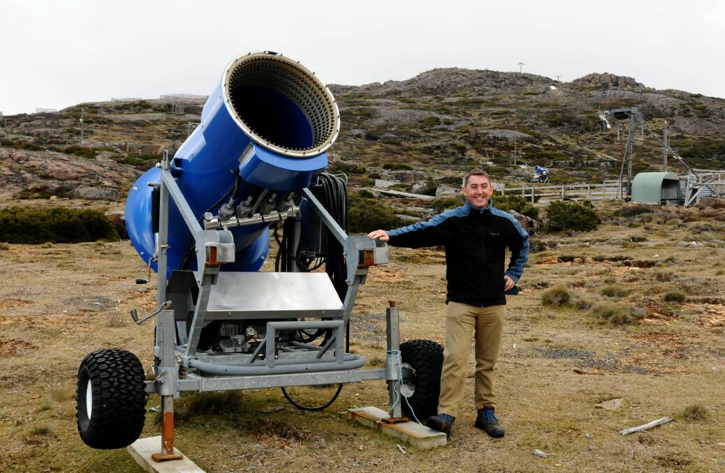 Ben Lomond Committee president Tony Gray with a new snow gun in 2015. 