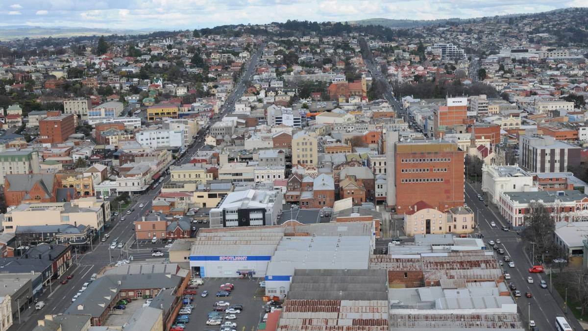 Chopper hovering over Launceston completing aerial survey