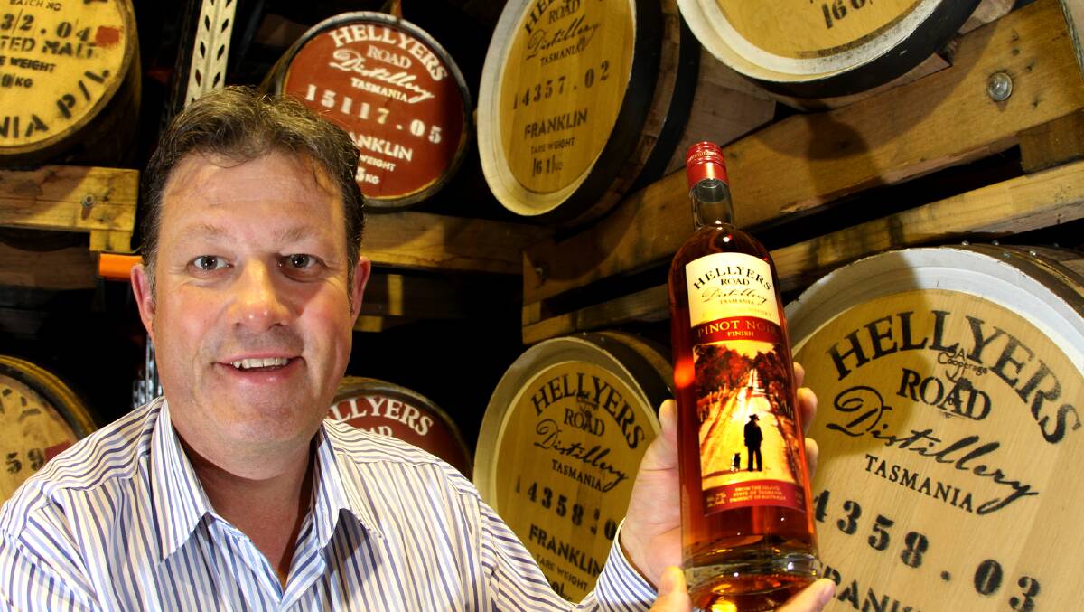 EXPORTED: Hellyers Road master distiller Mark Littler with a bottle of the highly acclaimed super-premium Pinot Noir Finish whisky. Picture: File 